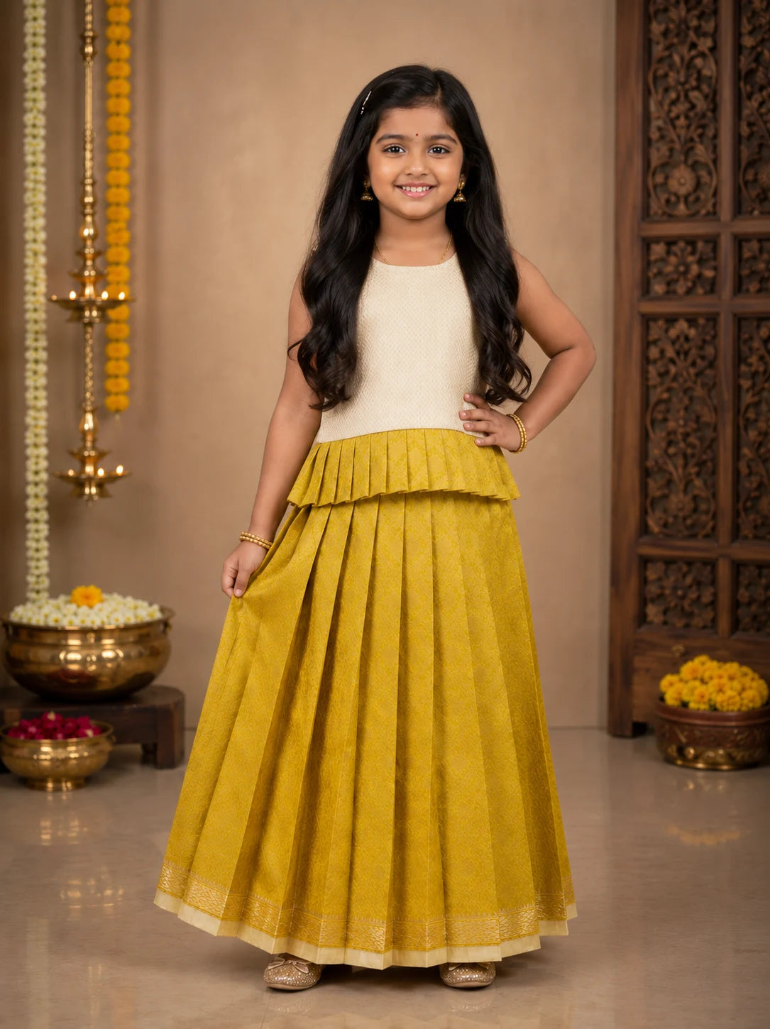 Young girl in a yellow and white traditional outfit standing in a decorated room.